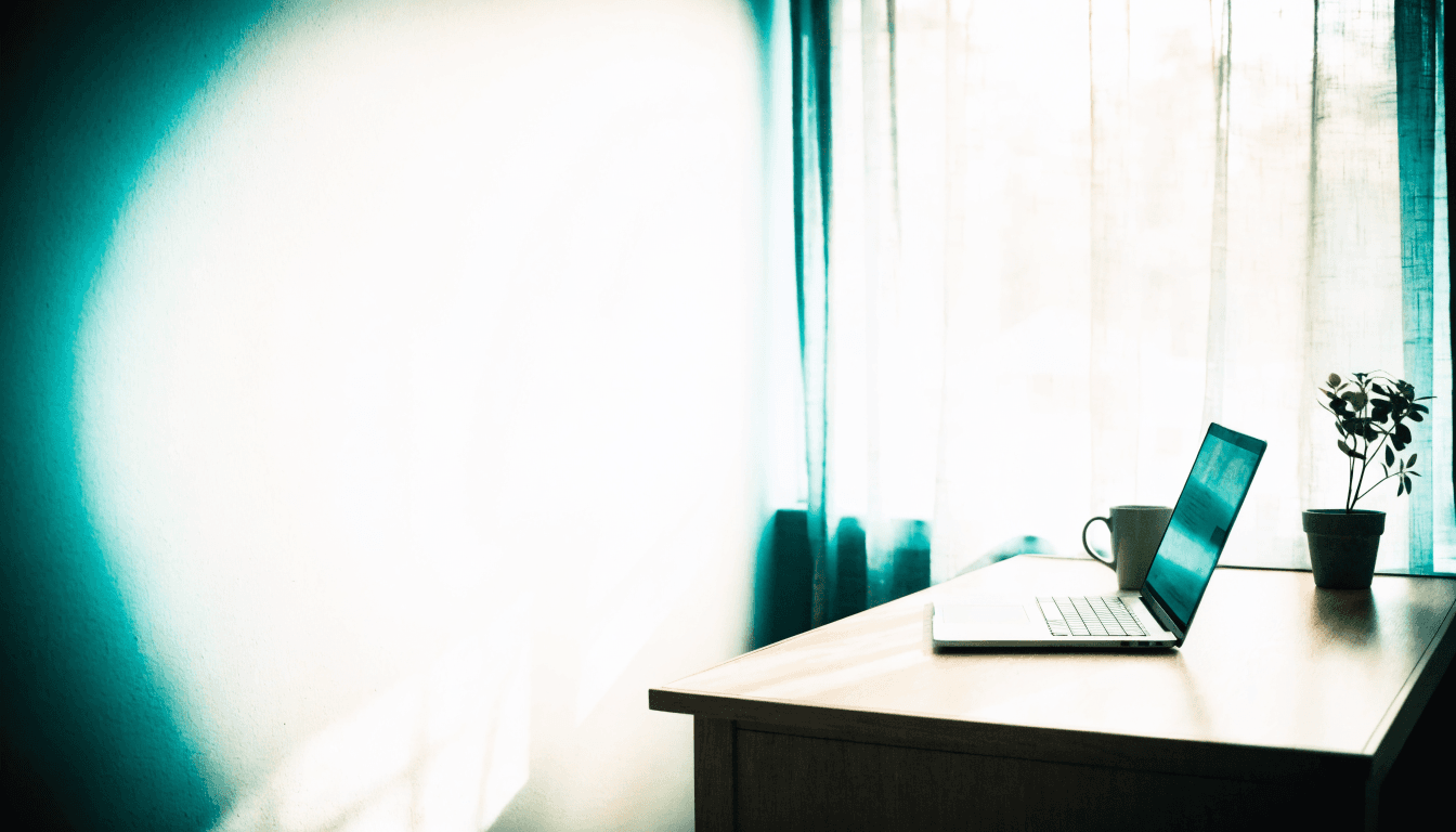 A serene therapist’s office with Ezren open on a laptop